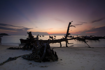 scenery of sunset at Pattaya Beach,Koh Lipe,Thailand. Soft focus,motion blur due to long exposure