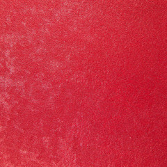 The texture of the velvet fabric red color