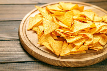 Sharp Mexican Nachos Chips. Concept - bad food, cafe, pub, party.