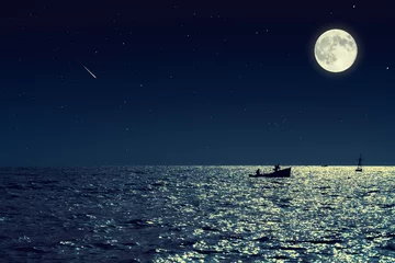 Wall murals Night Scenic view of small fishing boat in calm sea water at night and full moon