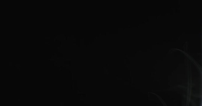 Steam(smoke) rise motion on black background. VFX element