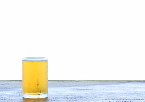 Beer in glass on white background