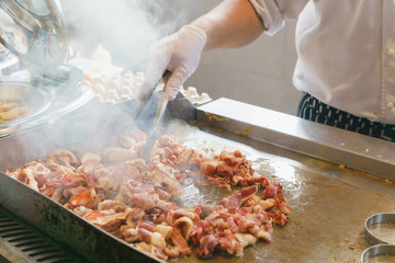 Chef is stirring beacon for american breakfast