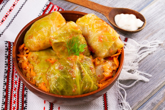 Stuffed cabbage leaves with meat. Cabbage rolls with meat, rice and vegetables. Dolma, sarma, sarmale, golubtsy or golabki, horizontal