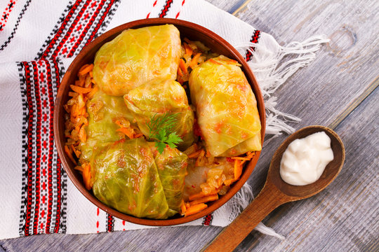 Stuffed cabbage leaves with meat. Cabbage rolls with meat, rice and vegetables. Dolma, sarma, sarmale, golubtsy or golabki. View from above, top, horizontal