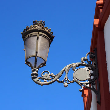 old vintage street light in tenerife spain with decorative traditional style and glass shade