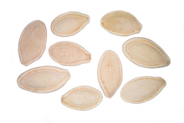 Pumpkin seeds on a white background seen from above