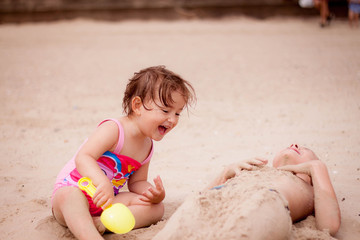 Girl and sunny day near sea