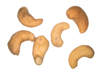 Some salted cashews on a white background