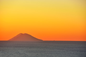 sunset of the volcano Stromboli seen from Tropea