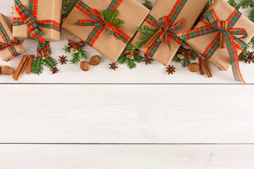 Colorful present boxes for any holiday on wooden background