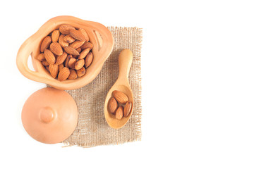 Almond seeds in a clay pot