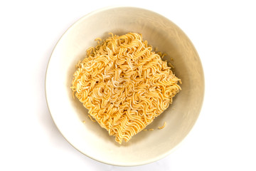 instant noodle in bowl on white background. View from the top