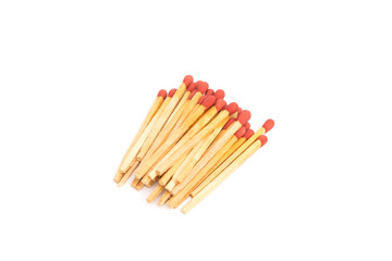 pile of new wooden match sticks on white background