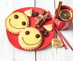 Cup of hot tea with lemon and cookies