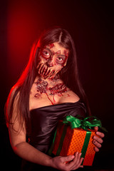 A zombie girl with sad eyes and a surprise gift in hands on a red black background, an image of a Halloween