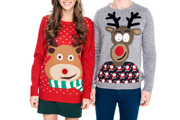 couple in winter festive sweaters