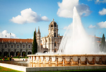Fototapeta premium Old Mosteiro dos Jeronimos with fountain, Lisbon, Portugal, retro toned