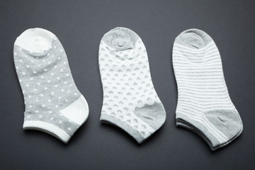 Set of new woman socks isolated on black background