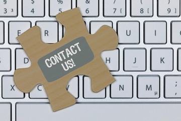Contact Us! on puzzle / keyboard