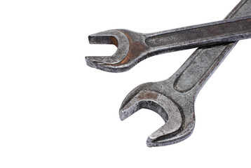 Shabby spanners closeup on white background
