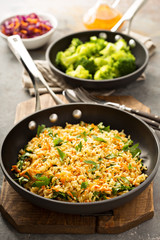 Fried rice with vegetables and steamed broccoli