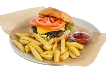 Juicy burger with french fries on a white background