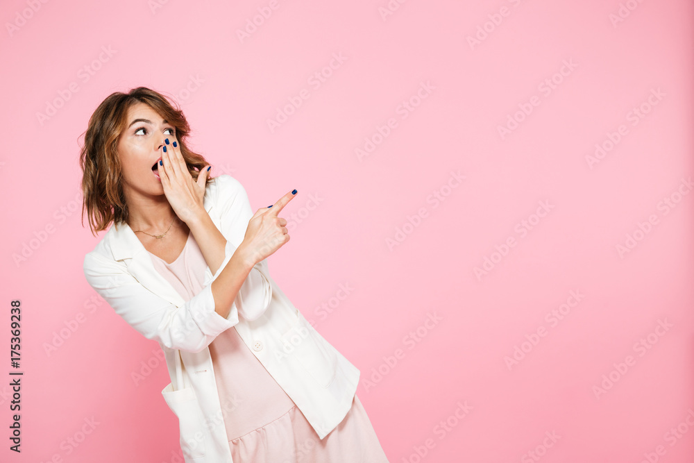 Wall mural portrait of a shocked young girl in