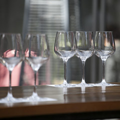 the empty glasses on the table for a banquet