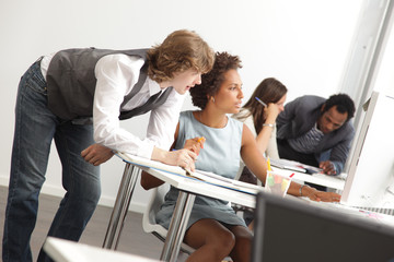 Fototapeta premium Young Start-up Professionals Serie: At work in A new Bright Office Space