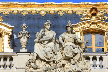 Sculptures on the roof of a building from the Cour de Marbre (Marble Courtyard) renovated in 2008. Palace of Versailles.
