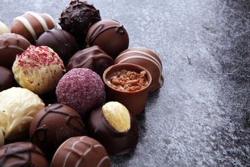 a lot of variety chocolate pralines, belgian confectionery gourmet chocolate
