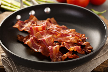 Cooked bacon on a skillet