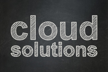 Fototapeta na wymiar Cloud technology concept: Cloud Solutions on chalkboard background