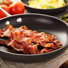 Cooked bacon on a skillet