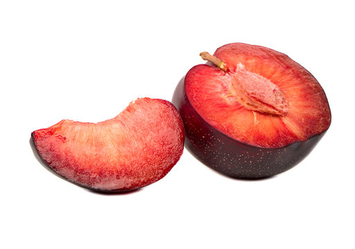 Half plums with slice