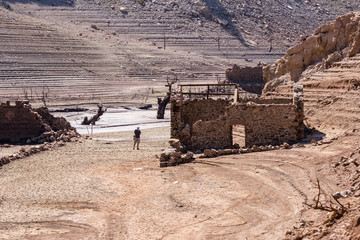 Ancient village engulfed in Mansilla de la Sierra, Spain, reappearing due to the persistent drought
