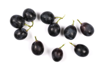Dark grapes, isolated on white background, top view