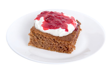 Fototapeta na wymiar cake with raspberry jam and sour cream isolated on white