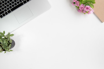 Work space desk tablet office top view overhead style nature have flower plant working laptop send email and book for write detail
