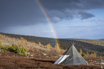 tsaatan yurt and a rainbow in a landscape of northern Mongolian taiga