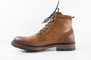 Male brown leather boot on white background, isolated product.