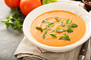 Tomato soup with olive oil and herbs