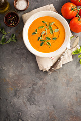 Tomato soup with olive oil and herbs