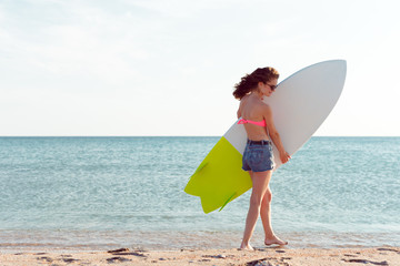 girl with surfboard