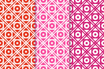 Geometric backgrounds. Set of red and pink seamless patterns