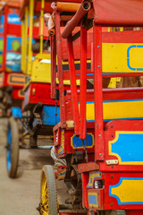 Fototapeta na wymiar Colored rickshaws