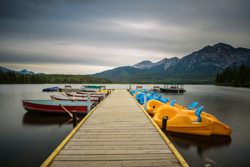 Boats on a jetty on the Pyramid Lake in Jasper National Park, Canada