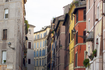 Fototapeta na wymiar streets of Rome. old houses. colored houses.