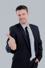 Portrait of a successful man giving a hand